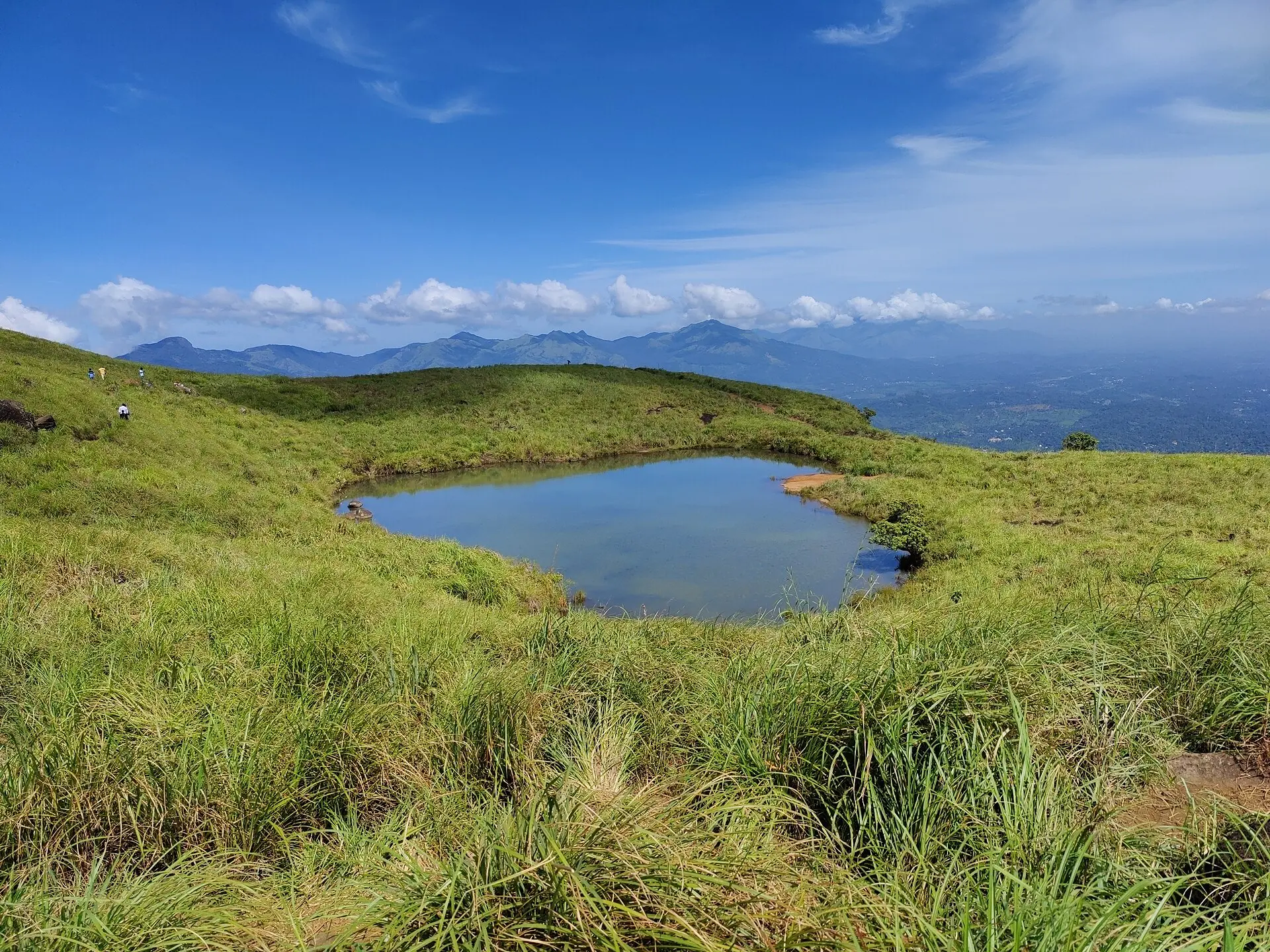 The heart-shaped lake on Chembra Peak above the hills of Wayanad